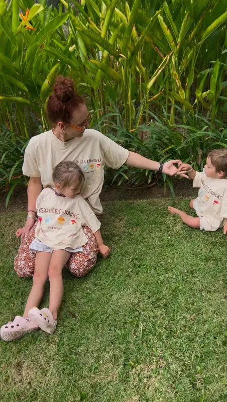 Family on holiday wearing matching shirts
