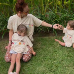 Family on holiday wearing matching shirts