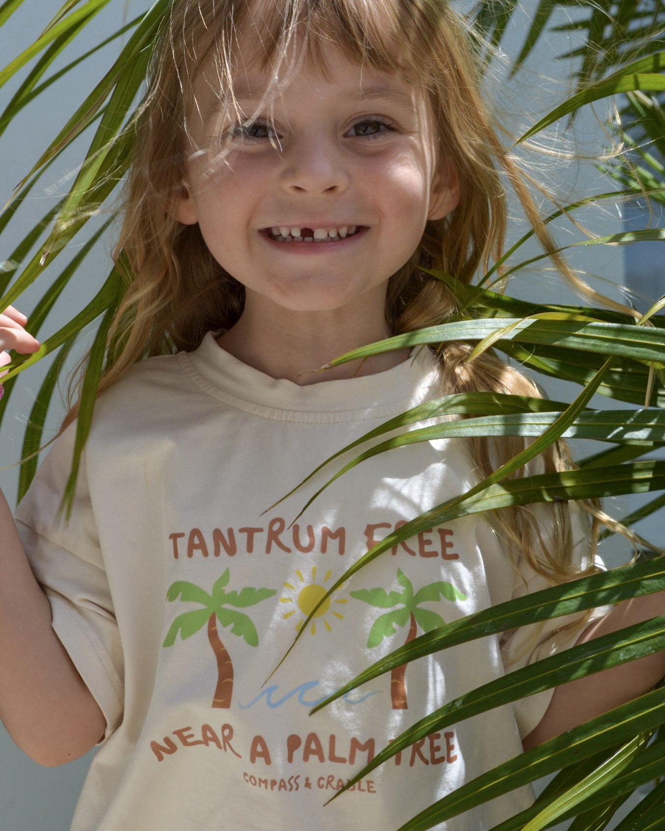 tantrum free near a palm tree beach kids tee beach wear Australia 