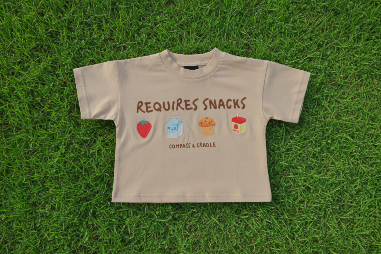 Requires Snacks Kids Summer Tee | Matching Family T-shirts Sandy Beige Compass & Cradle