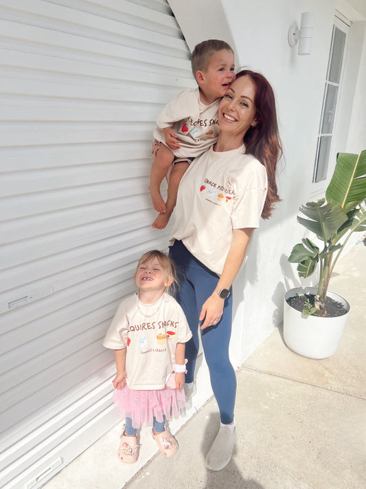 Mum and two children wearing matching t-shirts